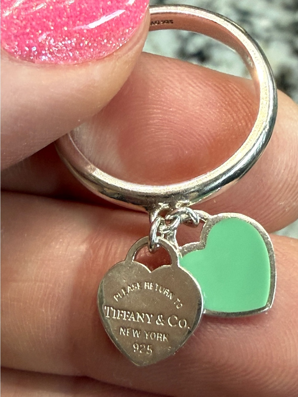 Details
RARE and discontinued Return to Tiffany & Co ring with dual heart charms